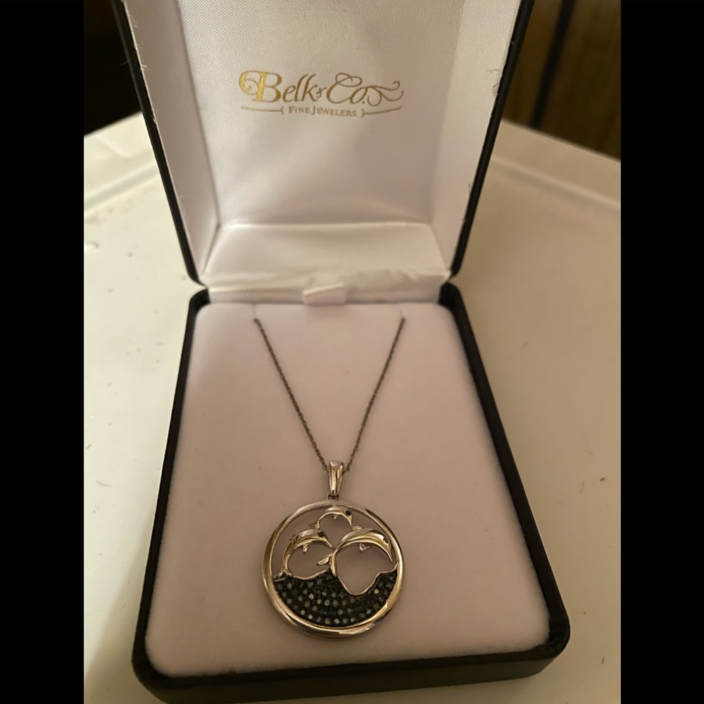 Brand new dolphin necklace.